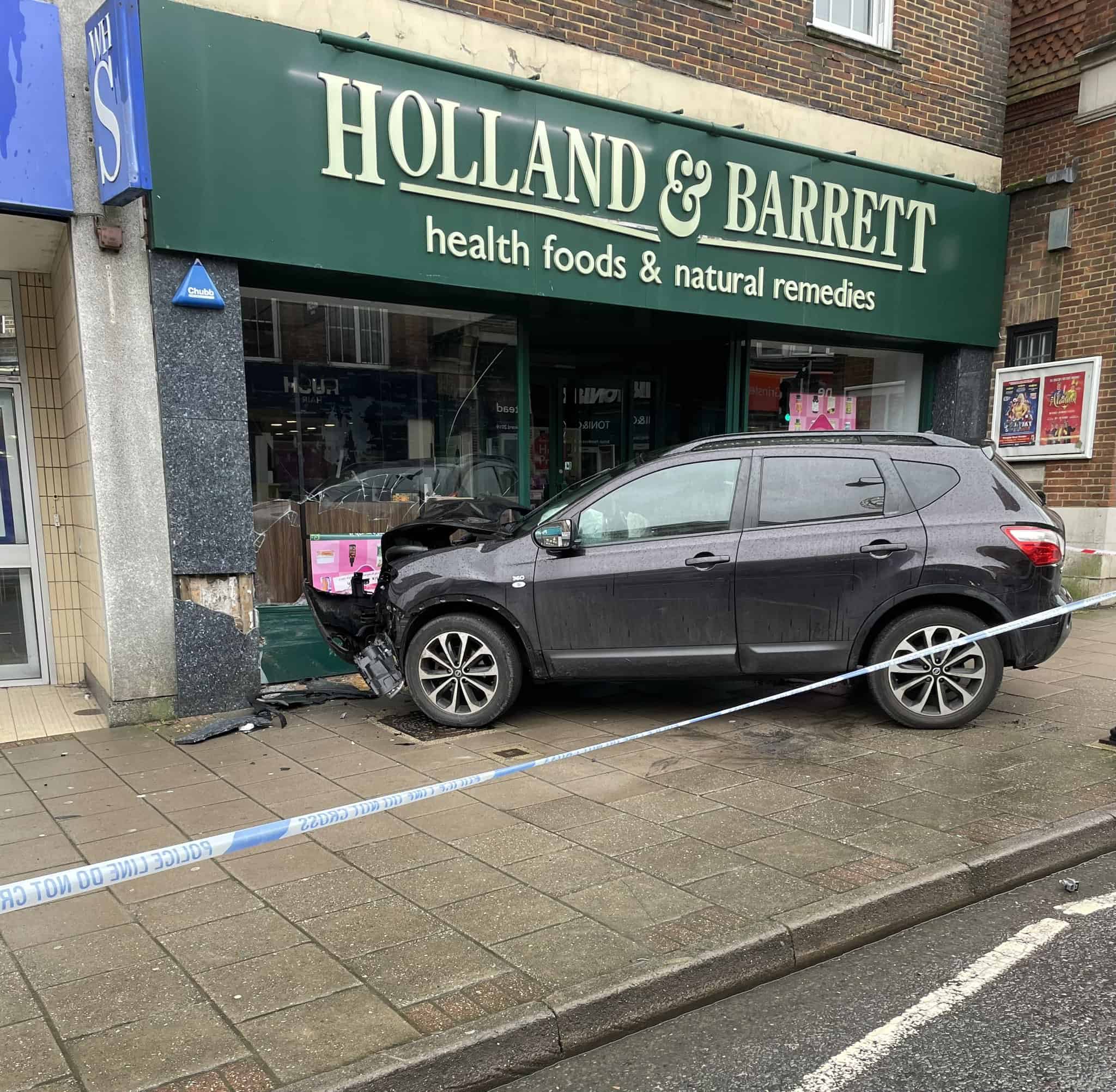 Sussex News Two taken to Hospital after car crashes into East Grinstead Shop