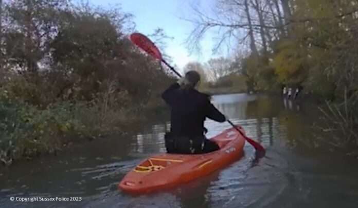 Police officers borrow kayaks after drink-driver gets stuck in flood
