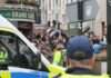 Football Fans clash with police at Brighton station 2024