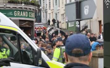 Football Fans clash with police at Brighton station 2024