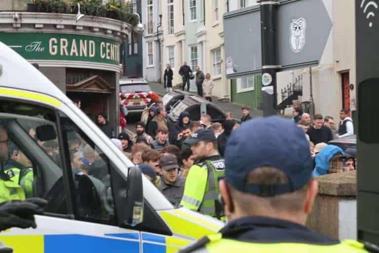 Football Fans clash with police at Brighton station 2024