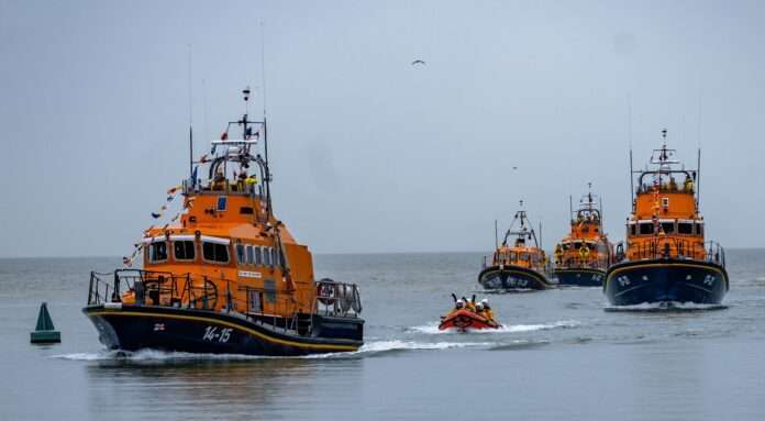 The 'Esme Anderson' made a grand entrance into the harbour, escorted by the Eastbourne D Class Inshore Lifeboat 'David H,' the station's current All Weather Lifeboat 'Henry Heys Duckworth,' and support from neighbouring stations' lifeboats in Hastings and Newhaven.