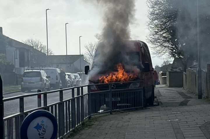 irefighters extinguish a blazing Parcel Force van in Brighton, confirming the fire's accidental nature.
