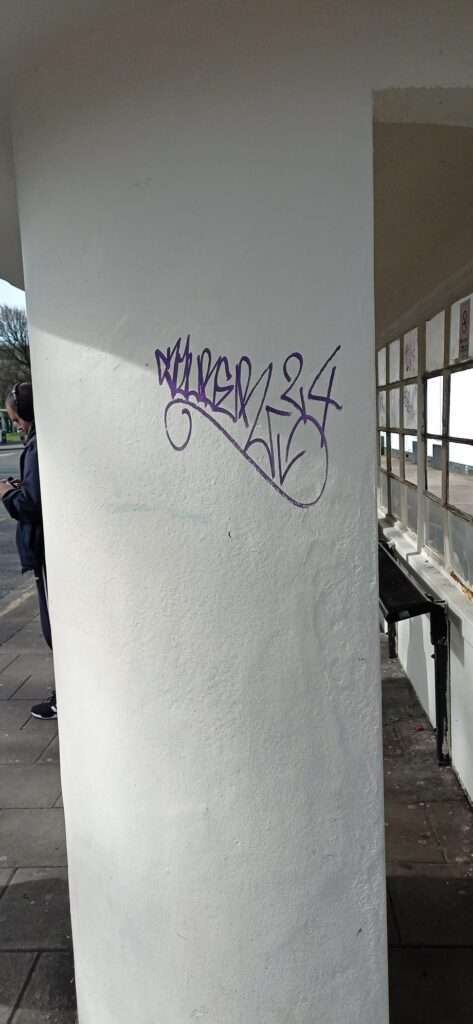 Graffiti artists deface freshly restored Grade 2 listed structure despite recent painting.