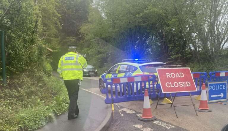 Man found dead with gunshot wound at scene of A286 car crash in Sussex