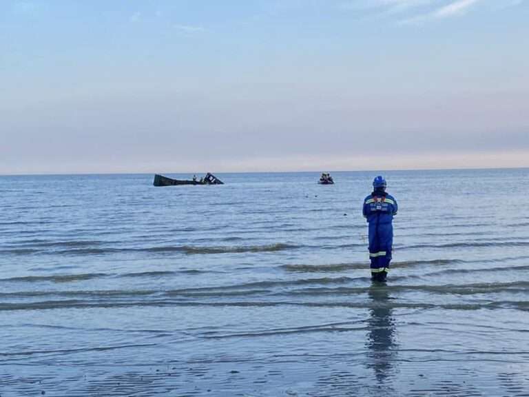 Two people saved from tidal waters with help from local rescue teams.