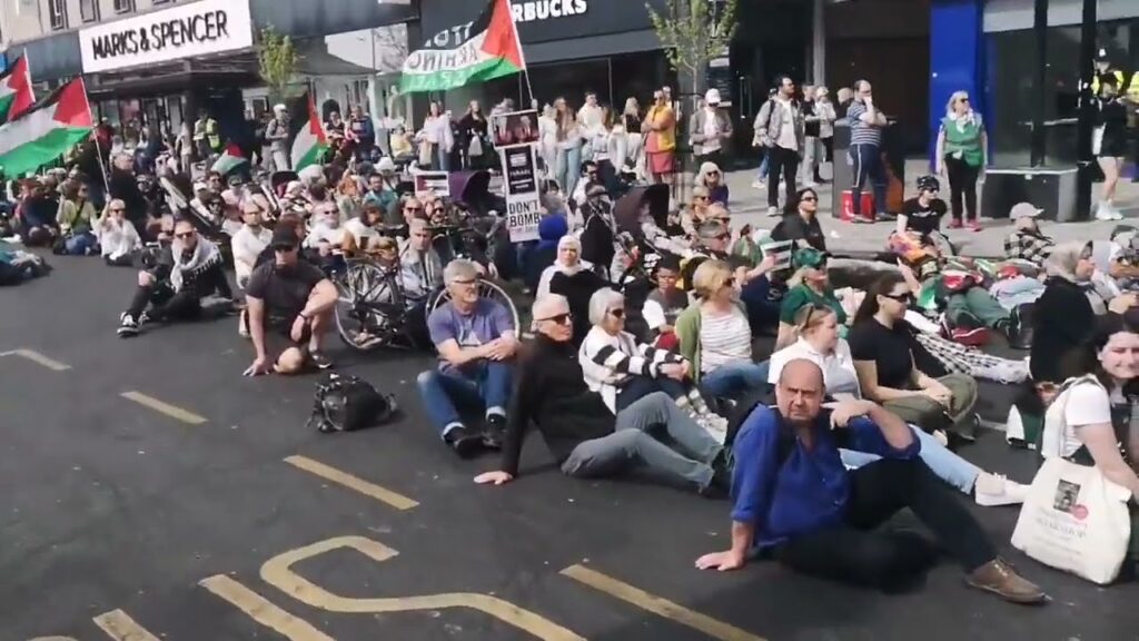 500 strong march now silently occupying the heart of Brighton city centre with a mass die-in. 