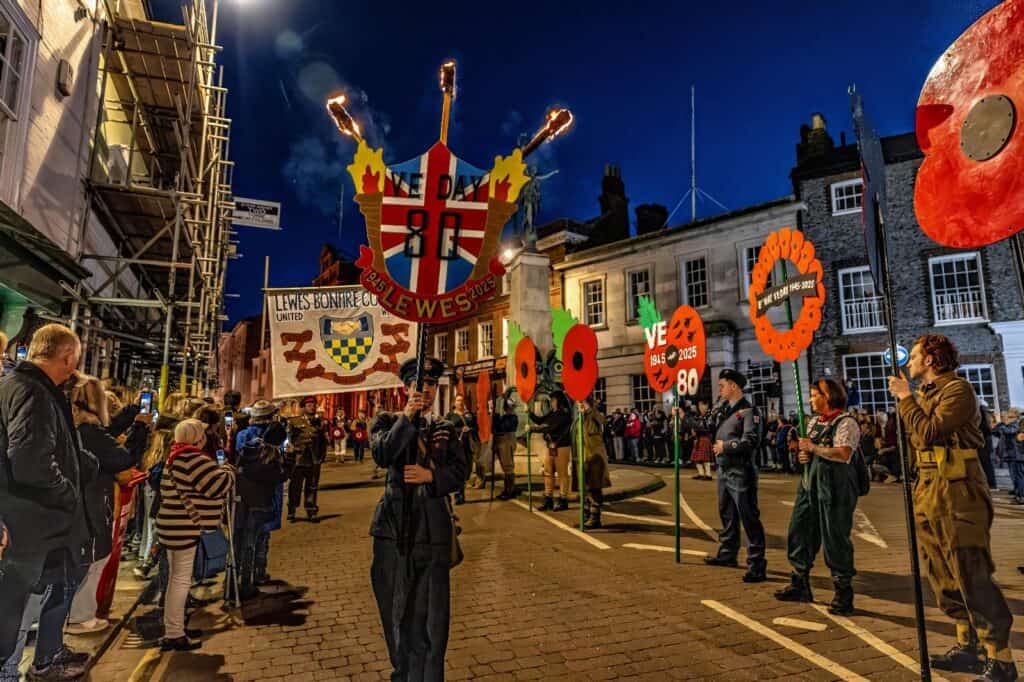 Lewes Bonfire Societies Unite for Historic VE Day Torchlit Procession