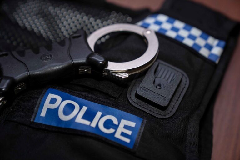 polcie vest handcuffs