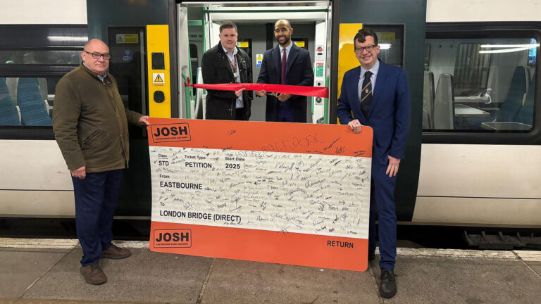 Head of Strategic Planning Phil Hutchinson, Josh Babarinde MP and Leader of Eastbourne Borough Council Cllr Stephen Holt celebrate the inaugural departure of the 06:47